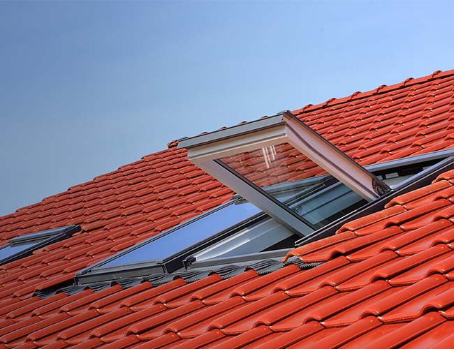 Orange roof with windows | featured image for Services.